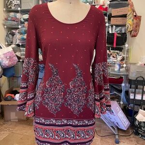 Vintage dress with bell sleeves.